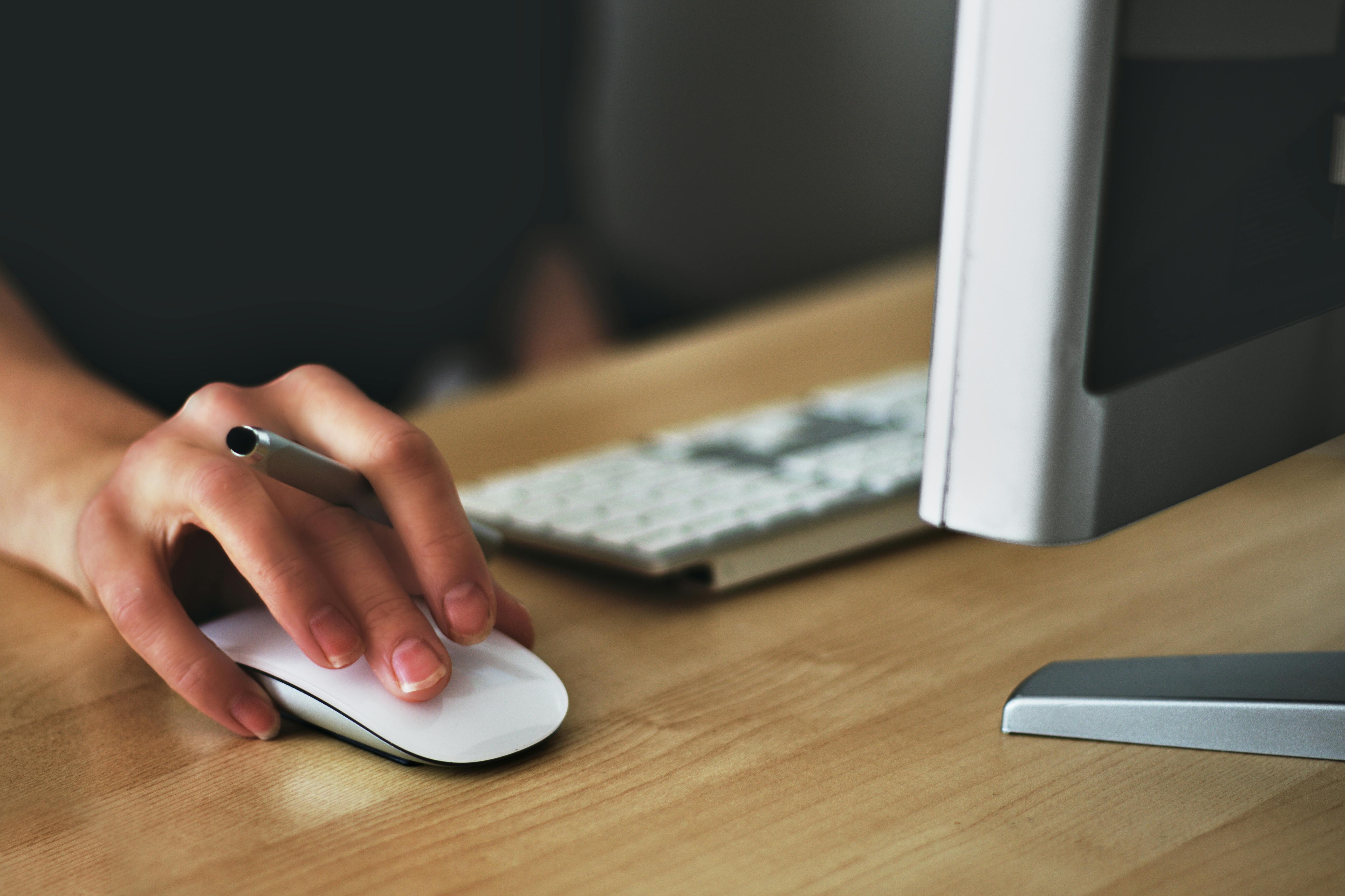 Person working on computer | Source: Pexels