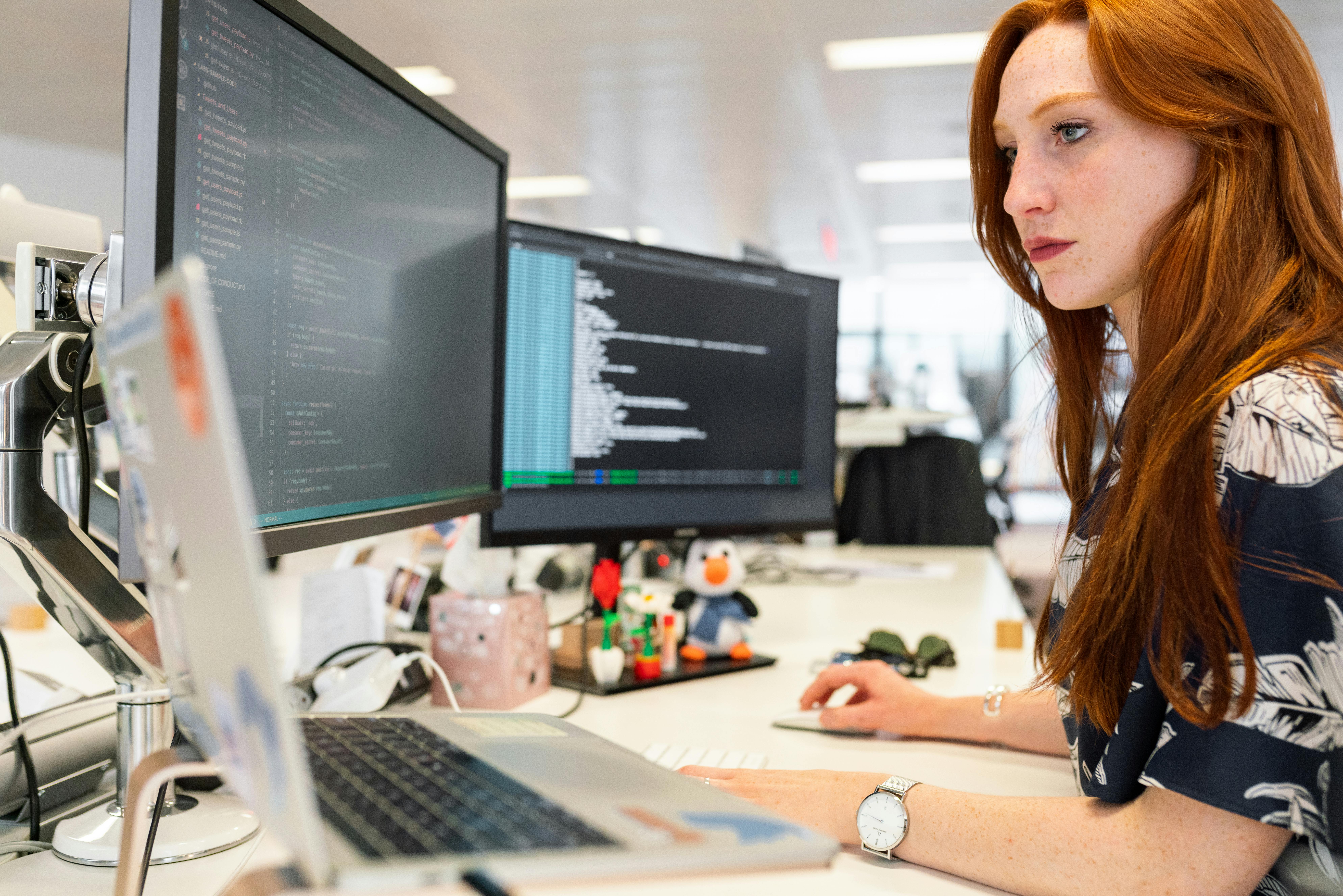 Person working on computer | Source: Pexels
