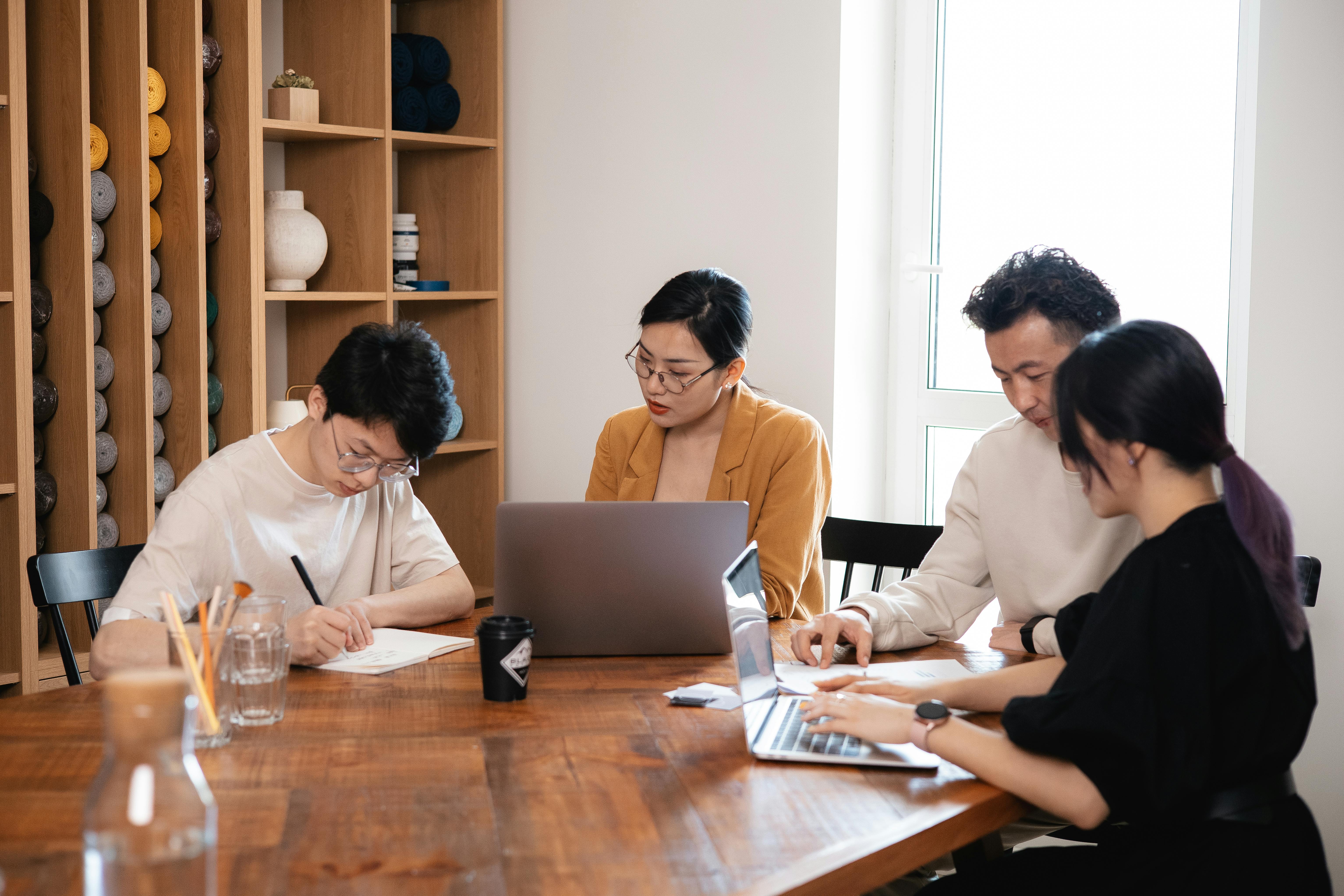 Students studying on campus | Source: Pexels