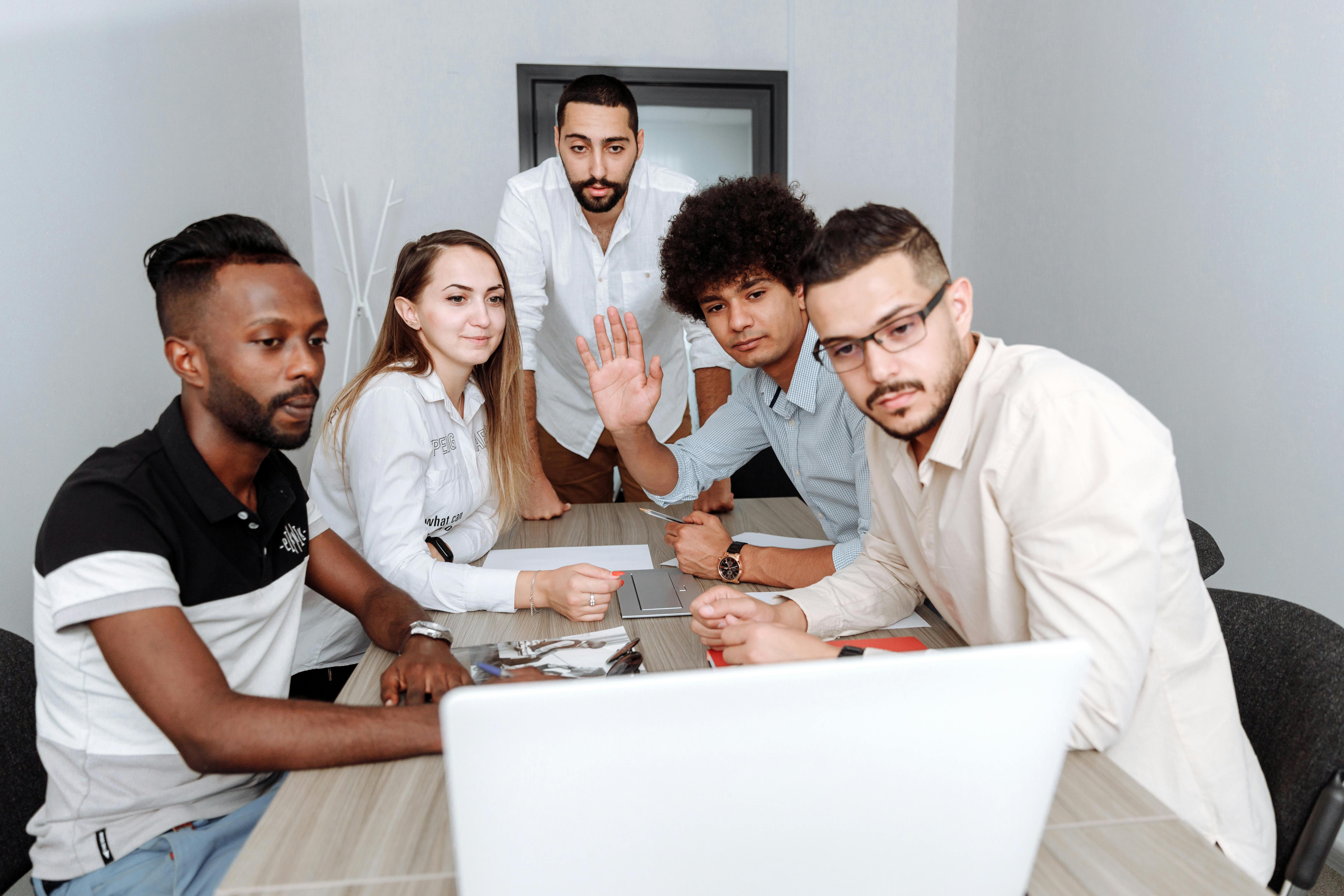 Group of people in a meeting | Source: Pexels