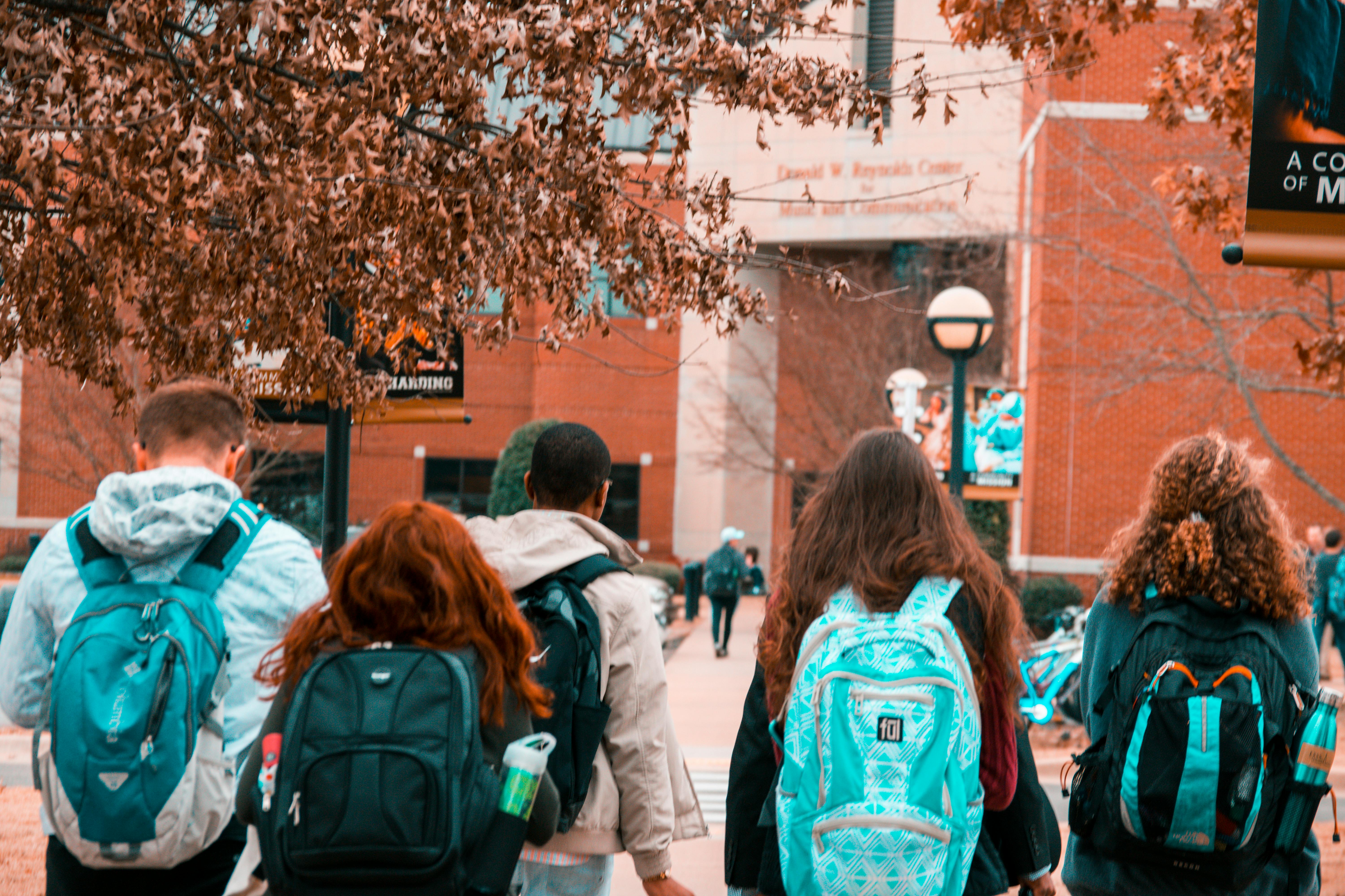 Students with backpacks | Source: Pexels